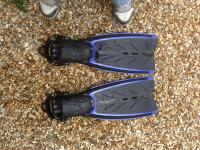 Oceanic velocity fins with spring straps