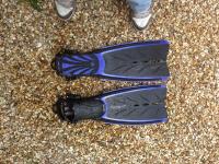 Oceanic velocity fins with spring straps
